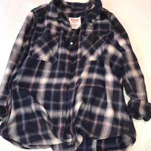 Navy blue, burnt orange, and white flannel